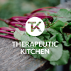 Therapeutic Kitchen logo design on a photograph of healthy food